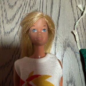 Barbie Blonde Doll with Blue Eyes and White Top
